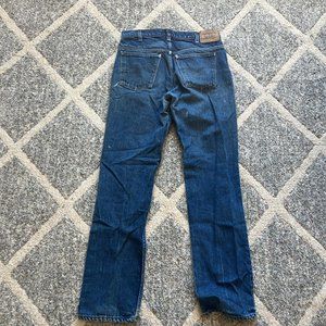 Vintage 90s stone washed navy Levi’s jeans
